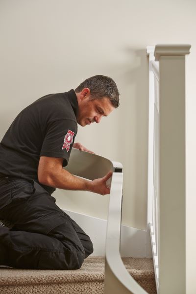 Acorn Installer installing a stairlift for a client