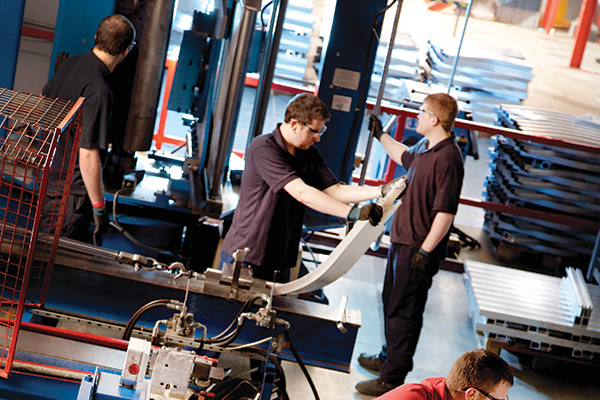 stairlift workers assembling stairlift