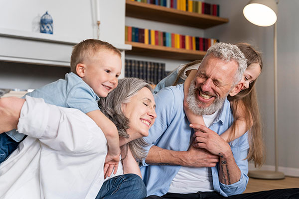 grandparents playing with grandkids